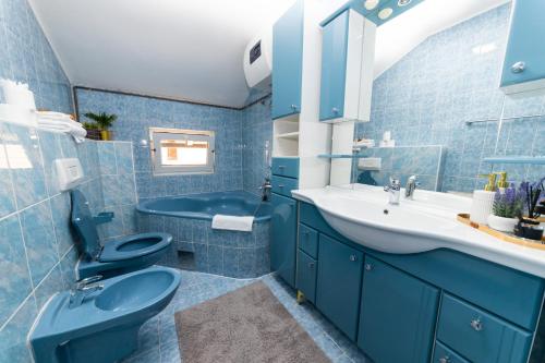 Koupelna v ubytování Khalilah Apartment 2