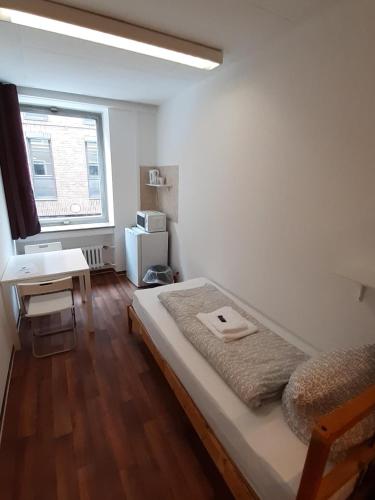 Katil atau katil-katil dalam bilik di 2-Rent Group Hostel Rooms&Apartments GKP2