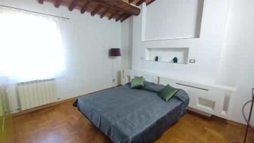 Un pat sau paturi într-o cameră la Casa Vio