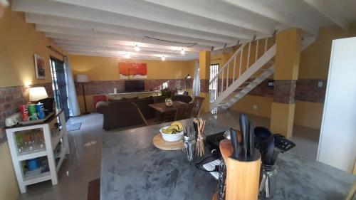 an aerial view of a living room and a living room at Country Breez Inn - Port Elizabeth in Gqeberha