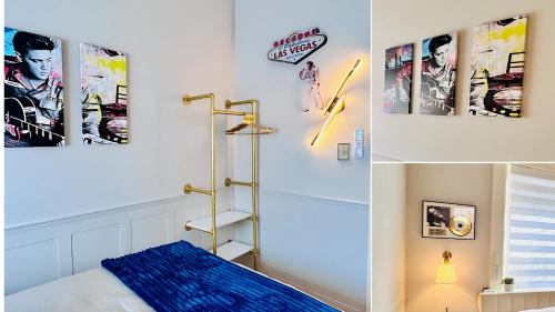 a room with a bed and posters on the wall at Hollywood Glam Themed Manor with Sauna for 12-People in Lancaster