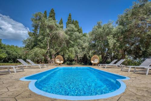 Πισίνα στο ή κοντά στο Villa Ninemia Seaview by Estia