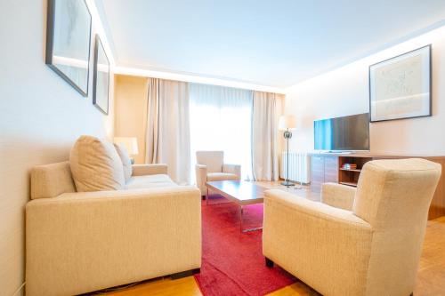 Televisyen dan/atau pusat hiburan di Aparto-Hotel Rosales
