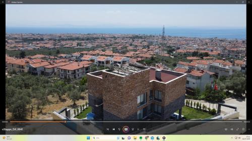 an aerial view of a city with buildings at Ornella Butik Otel in Edremit