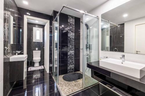Kúpeľňa v ubytovaní Amare La Vita Villa by Solmar Villas