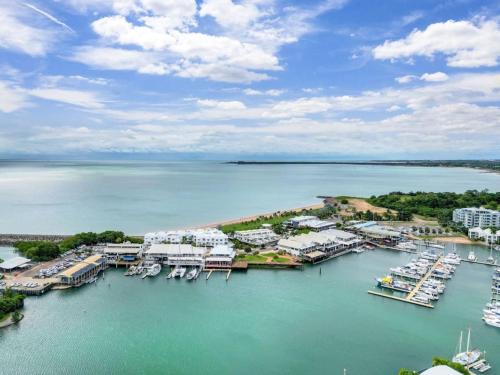 an aerial view of a marina with boats in the water at Marina View Sunset Magic in Larrakeyah