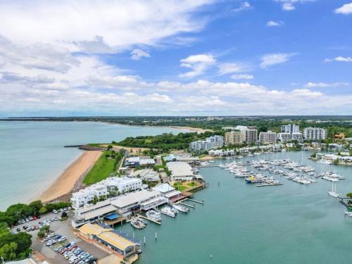 an aerial view of a marina with boats in the water at Marina View Sunset Magic in Larrakeyah