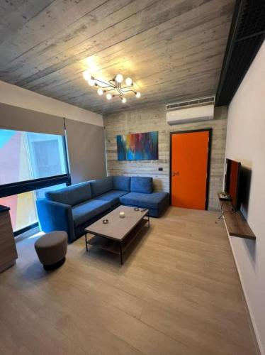 TV a/nebo společenská místnost v ubytování Al Amine 501 - 1-BR Mar Mikhael