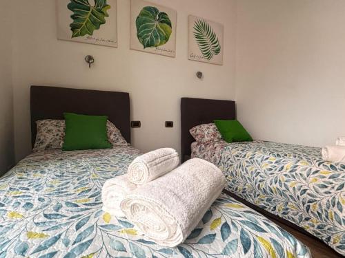 En eller flere senge i et værelse på La Casa di Eva