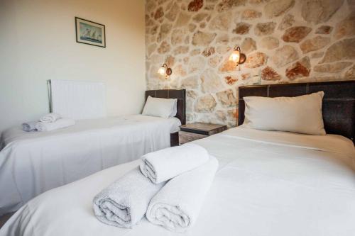 Ένα ή περισσότερα κρεβάτια σε δωμάτιο στο Orient Villa