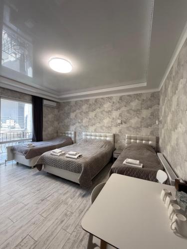 Ένα ή περισσότερα κρεβάτια σε δωμάτιο στο Hotel Kalyan & Spa