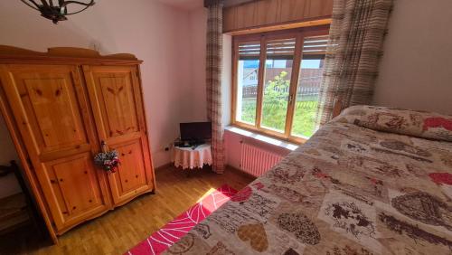 Ένα ή περισσότερα κρεβάτια σε δωμάτιο στο Resta home