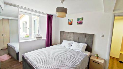 Postel nebo postele na pokoji v ubytování Apartments Halite