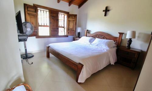 Giường trong phòng chung tại Casa Campestre Vista Hermosa