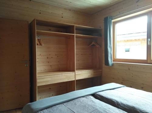 Postel nebo postele na pokoji v ubytování Walser Berg Chalets
