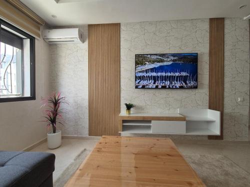 Cocon Bohème - Secure, Modern & Quiet in Kenitraにあるテレビまたはエンターテインメントセンター