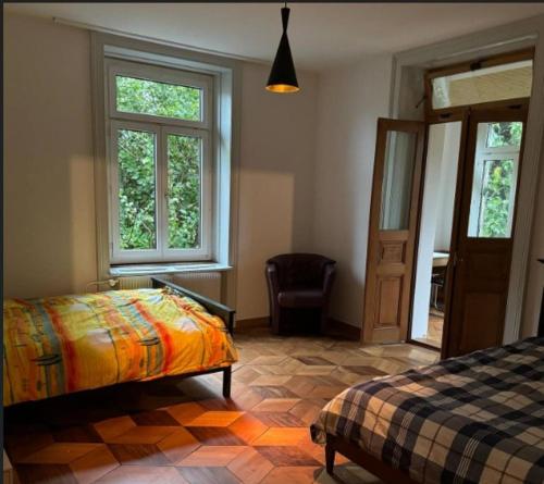Postel nebo postele na pokoji v ubytování Gemütliches Zimmer im 1OGB Nur 2 Min vom Hbf Solothurn entfern