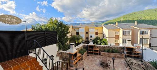 a view of a balcony of a building at Casa del Castillo by Naturadrada in La Adrada