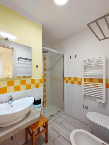 a bathroom with a sink and a shower at B&B Capo al Piano in Marciana Marina