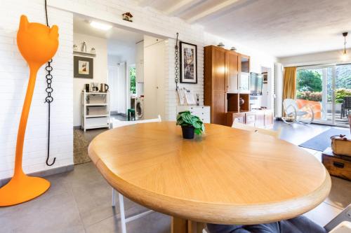 a kitchen and dining room with a wooden table at Dream Relax House in Monteggio