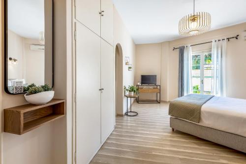 Ένα ή περισσότερα κρεβάτια σε δωμάτιο στο Aristo Apartment by Estia