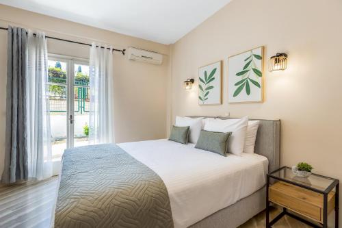 Ένα ή περισσότερα κρεβάτια σε δωμάτιο στο Aristo Apartment by Estia