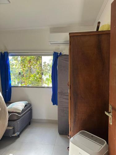 Ένα ή περισσότερα κρεβάτια σε δωμάτιο στο Casa Charme - Pé na Areia