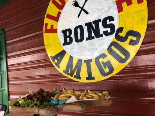 a sign on a wall with some food on it at Curupira Amazon Lodge - Private Jungle Tour, River Tour or Great Adventure Tour Included in the Walking Safari Price in Iranduba