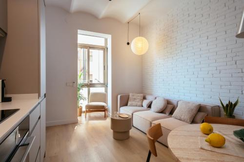 A seating area at Newly Renovated Stylish Eixample - Great Location