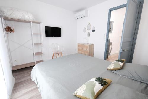 Postel nebo postele na pokoji v ubytování Maison de Vacances 2 Chambres avec rooftop