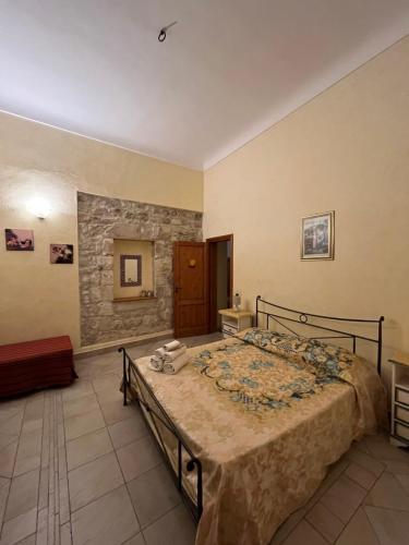 Posteľ alebo postele v izbe v ubytovaní B&b Candido Vacanze
