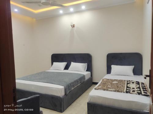 Una cama o camas en una habitación de G13 Haven