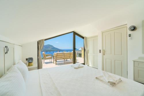 Ένα ή περισσότερα κρεβάτια σε δωμάτιο στο Villa Vista Mare