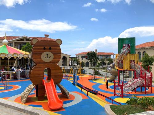 a playground at a resort with a teddy bear on it at Centara Mirage Resort Mui Ne in Mui Ne