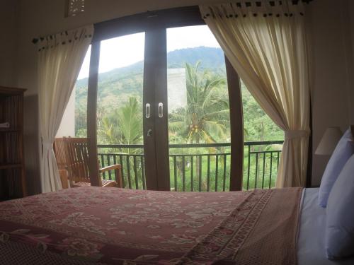 Балкон или терраса в Mesari Homestay & Warung