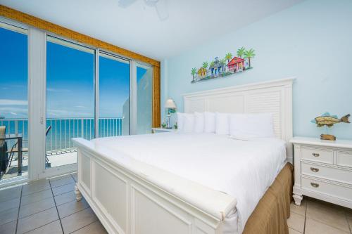 Ένα ή περισσότερα κρεβάτια σε δωμάτιο στο Lighthouse 1417 condo