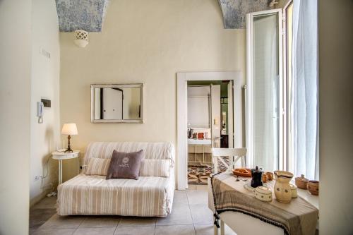 En eller flere senge i et værelse på Lu Poggiulu - Le Case di Valentina