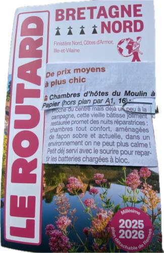 a sign for a flower show at a garden at Chambres d hôtes du Moulin à papier in Saint-Brieuc