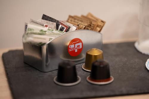 a close up of a toaster on a counter at Meg Lifestyle Hotel & Apartaments in Riccione