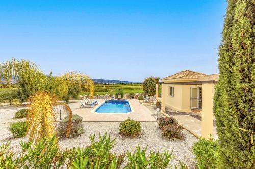 an image of a villa with a swimming pool at Villa Lime Tree in Lachi