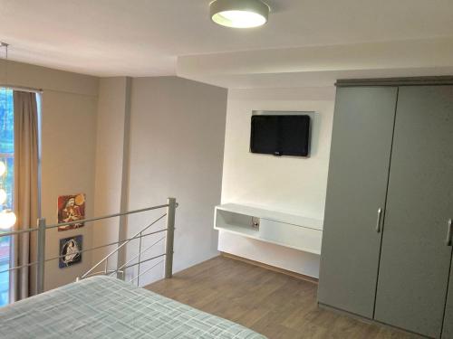 Katil atau katil-katil dalam bilik di Saint Sebastian Flat 514 Com Hidro até 2 pessoas