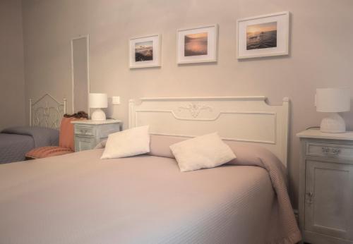 Katil atau katil-katil dalam bilik di Costa Bed and Breakfast