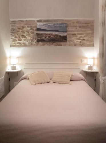 Katil atau katil-katil dalam bilik di Costa Bed and Breakfast