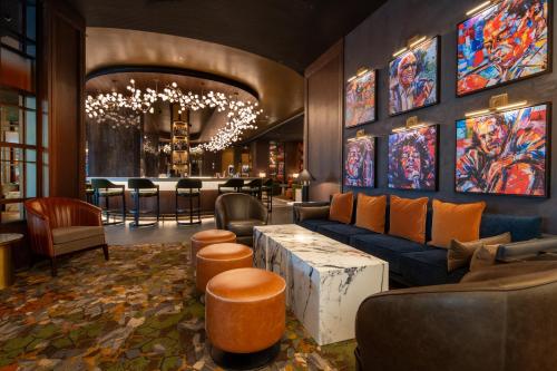 a lobby with a couch and a bar at Live Casino & Hotel - Louisiana in Bossier City