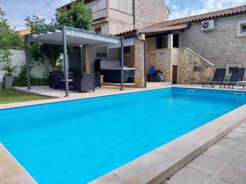 Πισίνα στο ή κοντά στο Villa Netto with private Pool and Jacuzzi