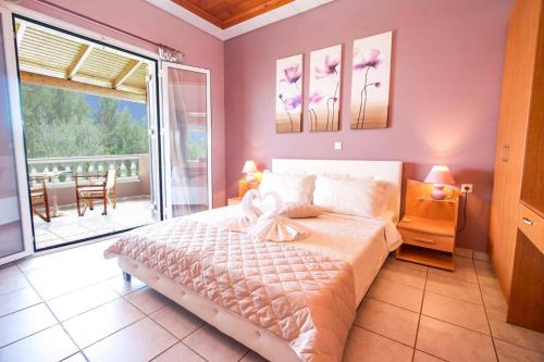 Posteľ alebo postele v izbe v ubytovaní Villa Neptune Sami by Villa Plus