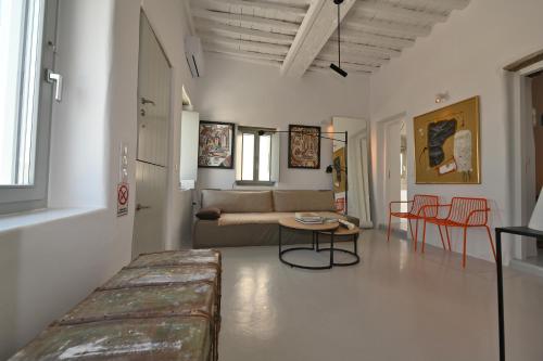 En eller flere senge i et værelse på Kariki Blue Triantaros-Tinos