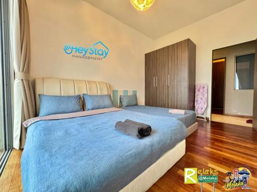 Cama o camas de una habitación en Silver Scape Residence Melaka Raya By Heystay Management