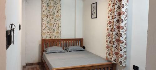 Postel nebo postele na pokoji v ubytování Sharia homestay