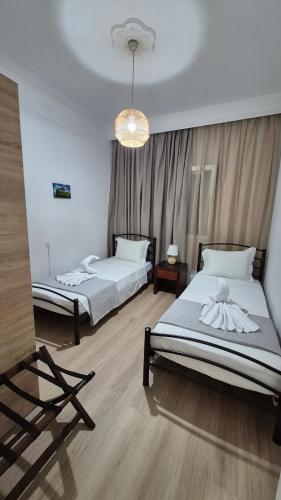 Ένα ή περισσότερα κρεβάτια σε δωμάτιο στο Apostolidis Home